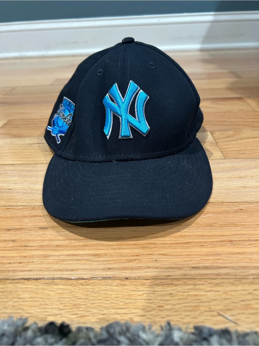 New Era Black Cap with Bright Blue NY Logo
